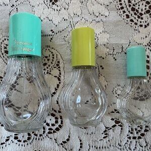 Set of Three Vintage Glass Avon Perfume Bottles with Colored Caps